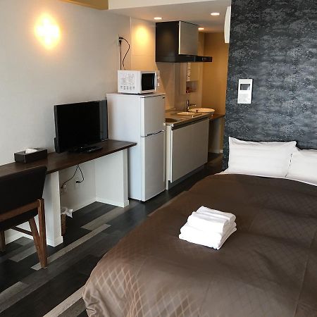 宜野湾市西原立交金城先生旅馆公寓式酒店 外观 照片